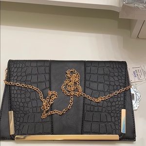 Black leather over the shoulder bag.